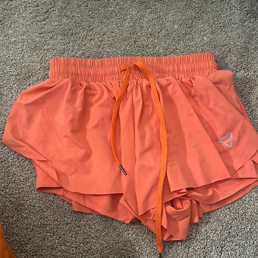 Loses flowy shorts with tight shorts built in under